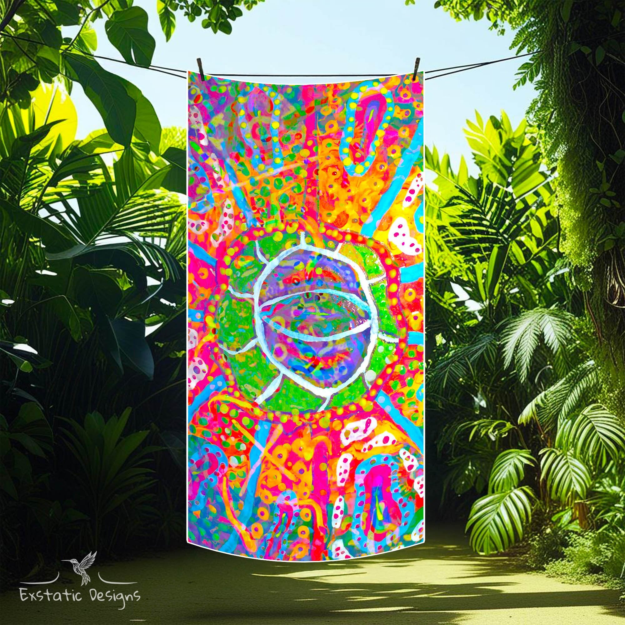 Serviette tantra & massage "Ouvre-l’Œil" aux couleurs vives avec œil magique central – création vibratoire signée Xavier Gaillot pour Exstatic Designs, dans un environnement de jungle.